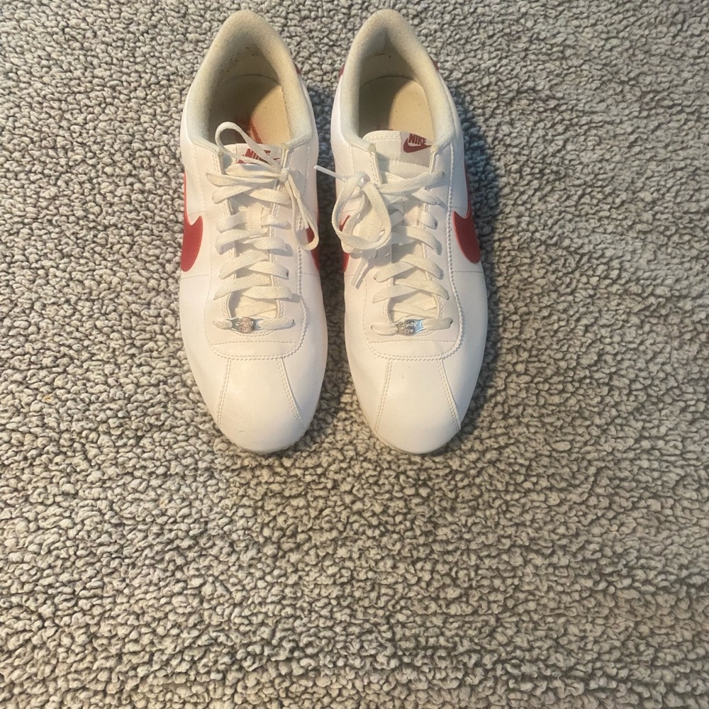 Nike White Leather Men's Sneakers with Red Swoosh Accent